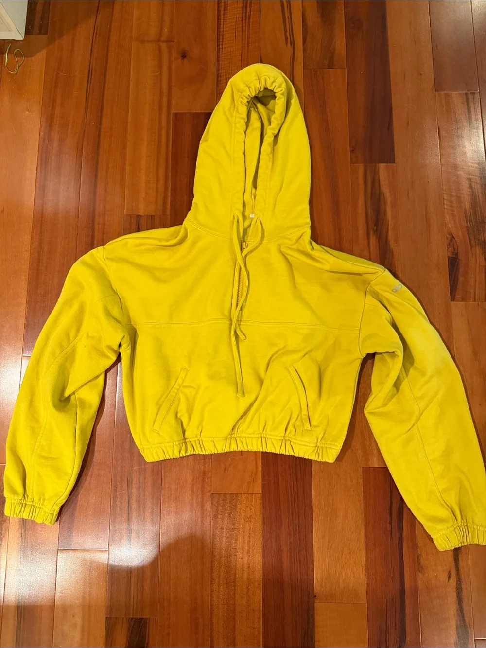 Alo Yoga Stadium Half Zip in Sulphur